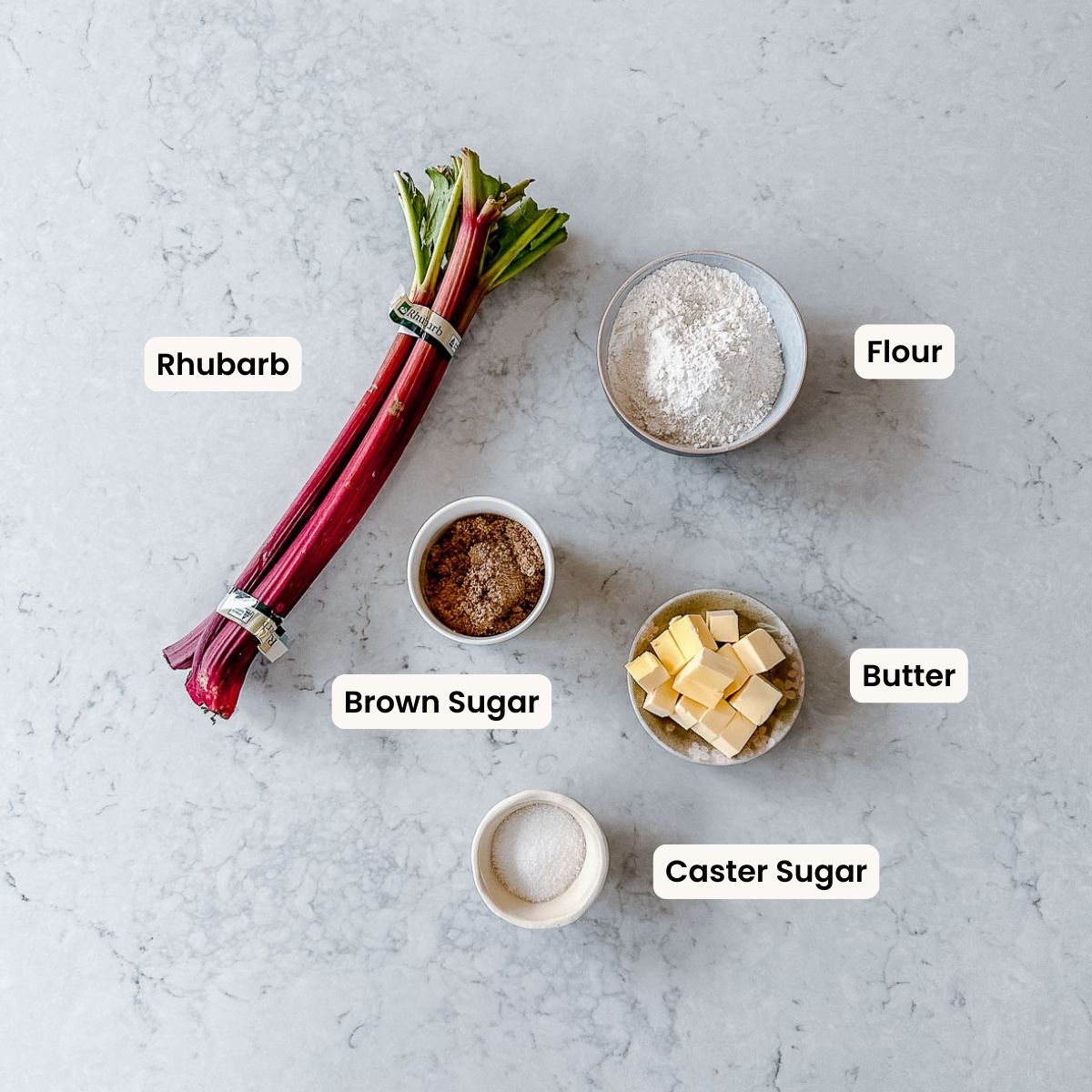 A collection of ingredients needed to make Rubarb Crumble.